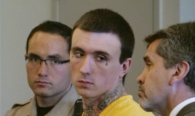 Austin Boutain, center, looks on during a court hearing Wednesday, Sept. 12, 2018, in Salt Lake Cit...