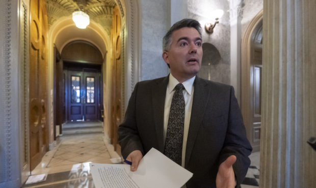 FILE - In this Dec. 31, 2018, file photo, Sen. Cory Gardner, R-Colo., arrives at the Senate Chamber...