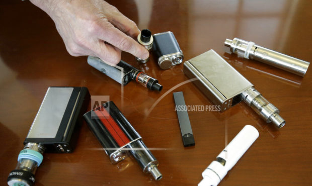 FILE - In this Tuesday, April 10, 2018 photo, a high school principal displays vaping devices that ...