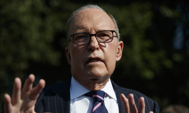 White House chief economic adviser Larry Kudlow talks with reporters outside the White House, Tuesd...