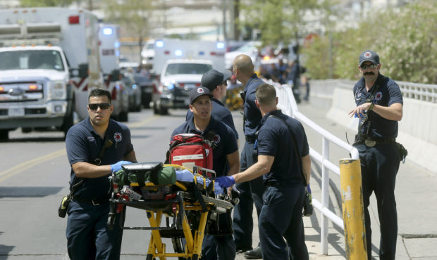 FILE - In this Aug. 3, 2019 file photo, El Paso Fire Medical personnel arrive at the scene of a sho...