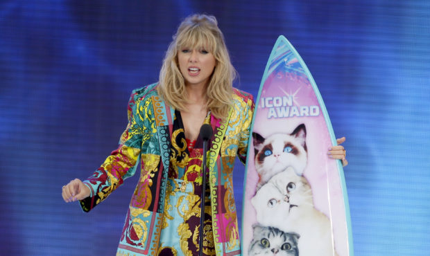 FILE - In this Aug. 11, 2019 file photo, Taylor Swift accepts the Icon award at the Teen Choice Awa...