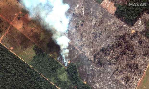 This Aug. 15, 2019 satellite image from Maxar Technologies shows closeup view of a fire southwest o...