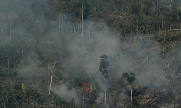Fire consumes an area near Jaci Parana, state of Rondonia, Brazil, Saturday, Aug. 24, 2019. Brazil ...