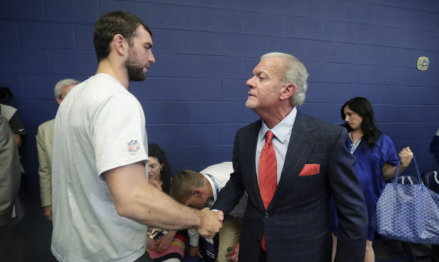 Indianapolis Colts quarterback Andrew Luck shakes hands with Indianapolis Colts owner Jim Irsay aft...