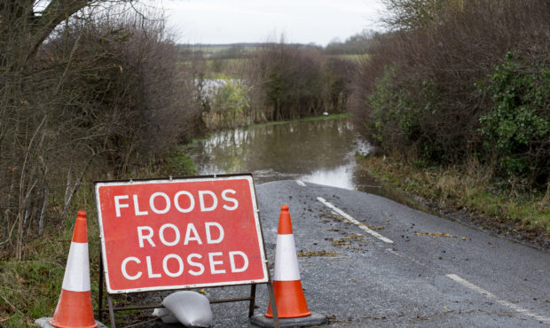 Road closed sign due to flooding in the English countryside. Photo courtesy of Getty Images....