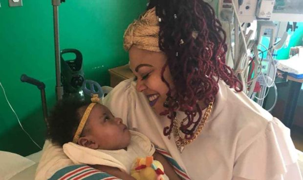 Monique Goldring holds her daughter, Phoenix, in the hospital....