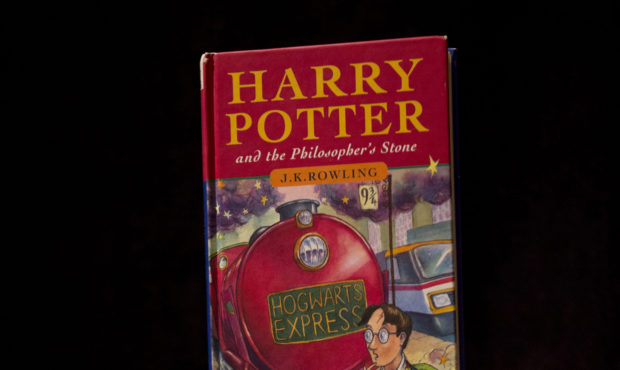FILE - This May 20, 2013, file photo shows a first edition copy of the first Harry Potter book "Har...