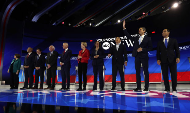 From left, Democratic presidential candidates Sen. Amy Klobuchar, D-Minn., Sen. Cory Booker, D-N.J....
