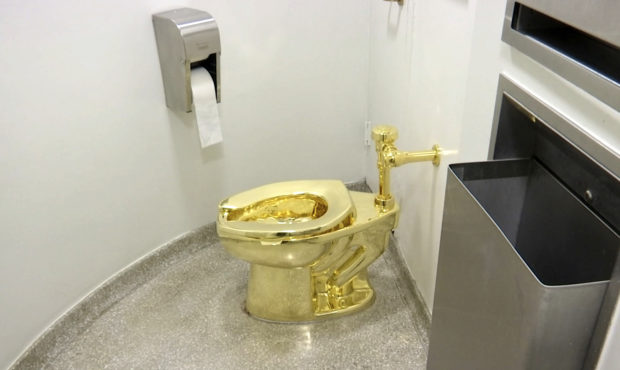 FILE - This Sept. 16, 2016 file image made from a video shows the 18-karat toilet, titled "America,...