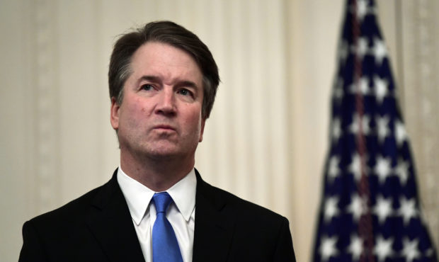 FILE - In this Oct. 8, 2018, file photo, Supreme Court Justice Brett Kavanaugh stands before a cere...
