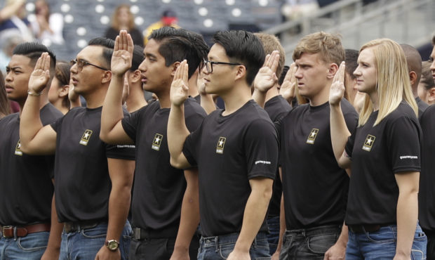 FILE - In this June 4, 2017, file photo. nNew Army recruits take part in a swearing in ceremony bef...