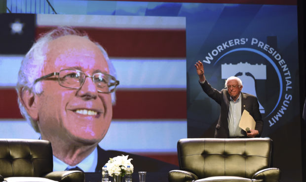 Democratic presidential candidate U.S. Sen. Bernie Sanders arrives onstage at the "Workers' Preside...