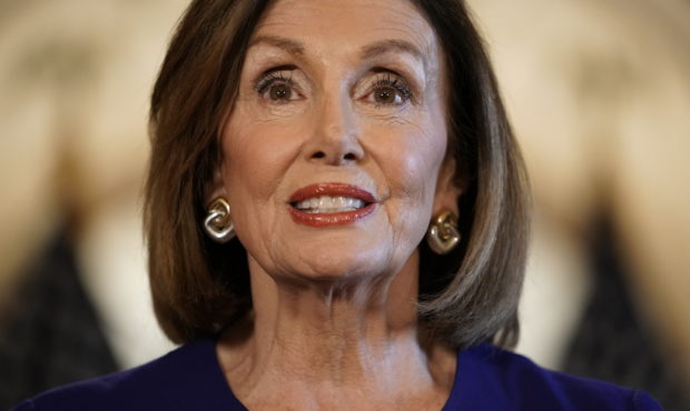 House Speaker Nancy Pelosi of Calif., reads a statement announcing a formal impeachment inquiry int...