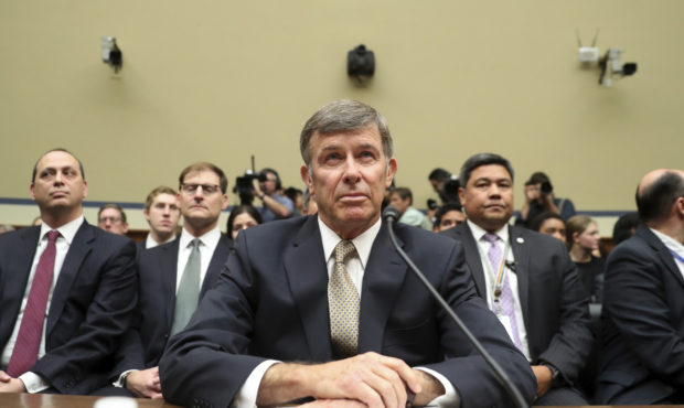 Acting Director of National Intelligence Joseph Maguire takes his seat before testifying before the...