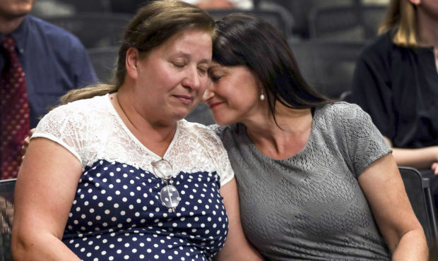 Maria Almiron, grandmother of 3-year-old Gabriel Almiron, left, and Brenda Marsh, mother of Emily A...