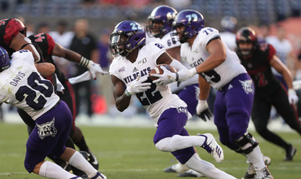 SAN DIEGO, CALIFORNIA - AUGUST 31:  Rashid Shaheed #22 of the Weber State Wildcats runs with the ba...