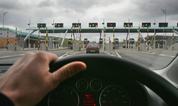 BIRMINGHAM, UNITED KINGDOM - MARCH 13:  A vehicle approach the M6 motorway toll booths on March 13,...