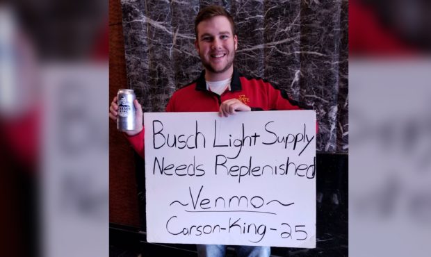 A college football fan who held up a sign on national TV asking for beer money has raised more than...