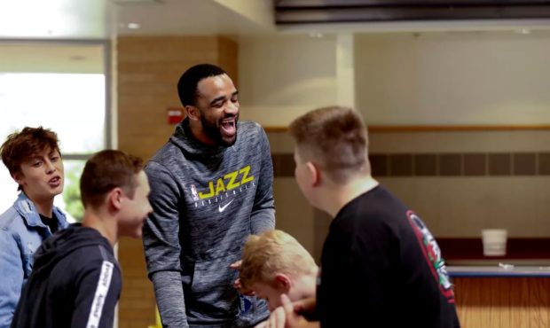 (Stanton Kidd laughing with students.  Credit: Laura Seitz, Deseret News)...