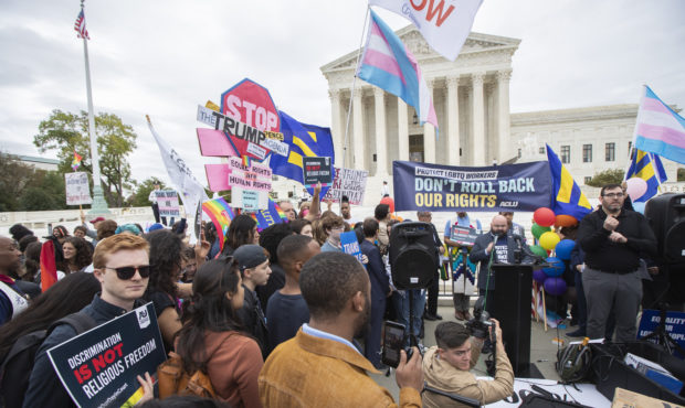 LGBT supporters gather in front of the U.S. Supreme Court, Tuesday, Oct. 8, 2019, in Washington. Th...