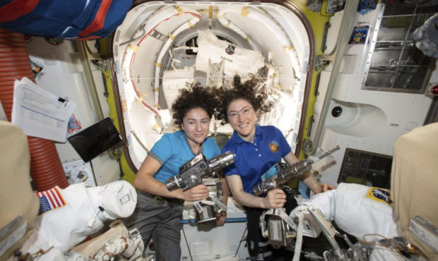 In this photo released by NASA on Thursday, Oct. 17, 2019, U.S. astronauts Jessica Meir, left, and ...