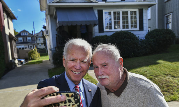 Former U.S. Vice President Joe Biden takes a selfie with Paul McGloin while visiting his childhood ...