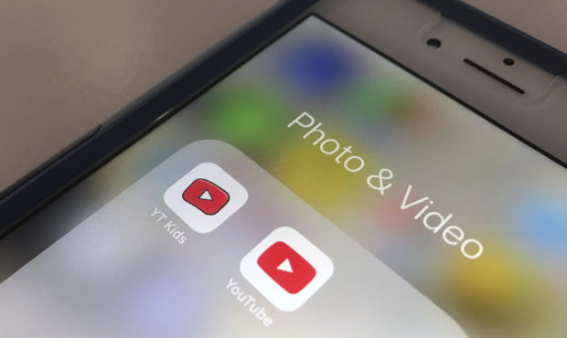 FILE - In this Wednesday, April 25, 2018, file photo, the YouTube app and YouTube Kids app are disp...