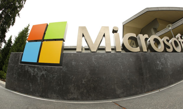 FILE - This July 3, 2014, file photo, shows the Microsoft Corp. logo outside the Microsoft Visitor ...