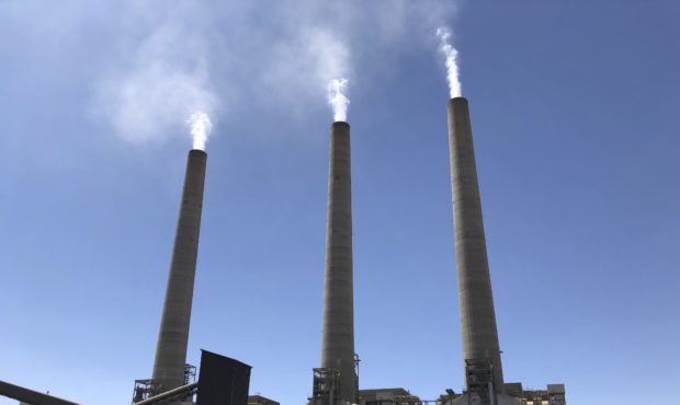 This Aug. 20, 2019, image shows a trio of concrete stacks at the Navajo Generating Station near Pag...