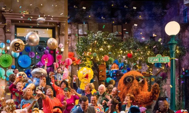 This image released by HBO shows the cast of "Sesame Street" during a celebration of their 50th sea...