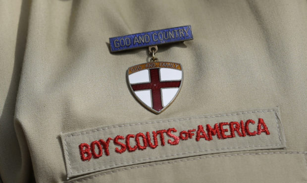 FILE - In this Feb. 4, 2013 file photo, shows a close up detail of a Boy Scout uniform worn during ...