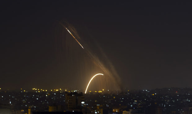 Rockets are launched from the Gaza Strip towards Israel, Wednesday, Nov. 13, 2019.  Israeli aircraf...