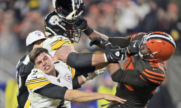 Cleveland Browns defensive end Myles Garrett (95) hits Pittsburgh Steelers quarterback Mason Rudolp...