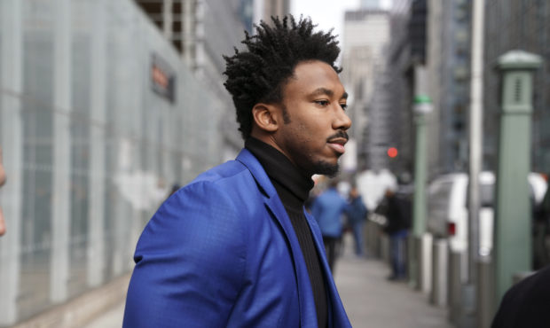 Cleveland Browns star defensive end Myles Garrett leaves an office building in New York, Wednesday,...