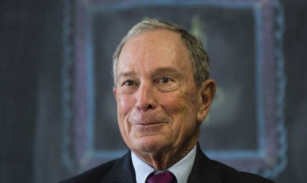 FILE - In this Nov. 30, 2018 file photo, former New York Mayor Michael Bloomberg speaks with member...