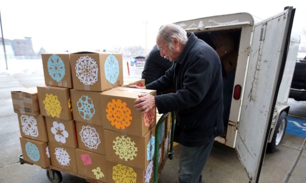 FILE -- Pete Schwager loads boxes of donated goods while volunteering for Shalom Salaam Tikkun Olam...