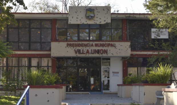 The City Hall of Villa Union is riddled with bullet holes after a gun battle between Mexican securi...