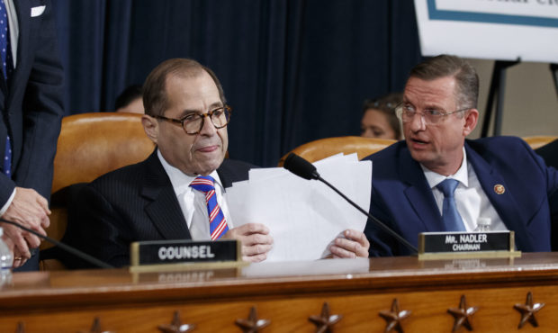 House Judiciary Committee Chairman Rep. Jerrold Nadler, D-N.Y., left, gathers his papers as ranking...