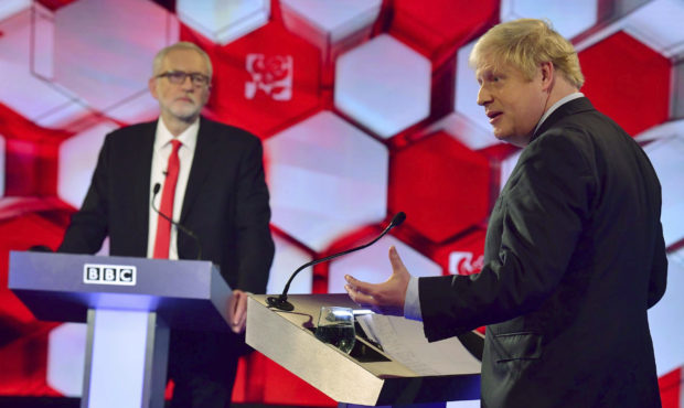 Opposition Labour Party leader Jeremy Corbyn, left, and Britain's Prime Minister Boris Johnson, dur...