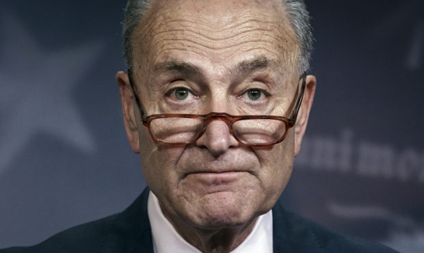 FILE - In this Monday, Dec. 9, 2019, file photo, Senate Minority Leader Chuck Schumer, D-N.Y., spea...