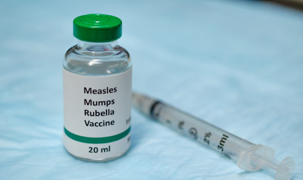MMR vaccine holding in hand with injection syringe at the background. Photo: GettyImages...