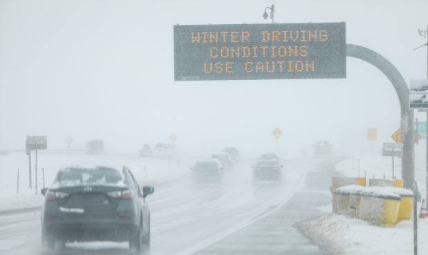 DENVER, CO - NOVEMBER 26: Drivers make their way along slick and snowy roads on November 26, 2019 i...