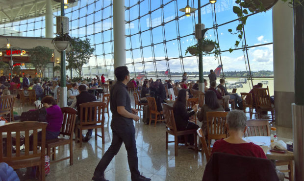SEATAC, WA - APRIL 14, 2016: Travelers enjoy the relaxation, panoramic views, and architecture of t...