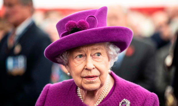 Britain's Queen Elizabeth II talks with volunteers and workers of the Royal British Legion Industri...