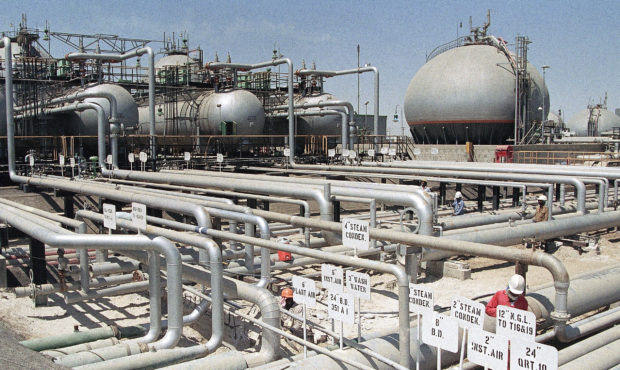 FILE - In this file photo dated 1990, Aramco refinery at Ras Tannura, Saudi Arabia. The price of oi...