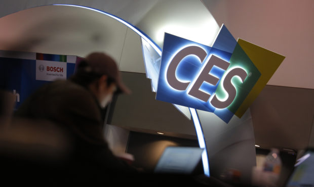 A worker helps set up a booth before CES International, Saturday, Jan. 4, 2020, in Las Vegas. (AP P...