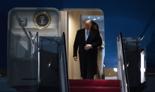 President Donald Trump and first lady Melania Trump exit Air Force One, Sunday, Jan. 5, 2020, at An...