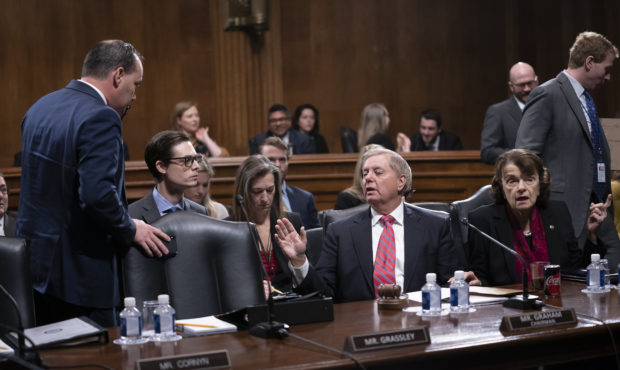 Senate Judiciary Committee Chairman Lindsey Graham, R-S.C., right, speaks with Sen. Mike Lee, R-Uta...