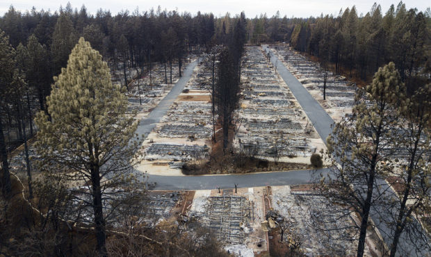 File - In this Dec. 3, 2018, file photo, are homes leveled by the Camp Fire line the Ridgewood Mobi...